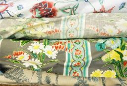 Three rolls of cotton furnishing material including 'Bird and Thistle' by JP & J Baker, blue