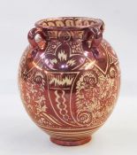 Spanish Valencia Hispano Moresque style pink lustre pottery vase having four scroll handles, ovoid