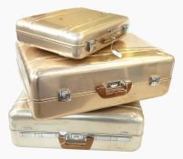 Set of three Halliburton Zero aluminium cases viz:- two suitcases and one briefcase, having fitted