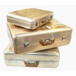 Set of three Halliburton Zero aluminium cases viz:- two suitcases and one briefcase, having fitted