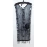 1920's net and beaded tabard with embroidered sequins and beads