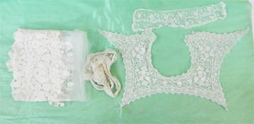 Lace and broderie anglaise baby's bonnet and assorted lace and crocheted trimmings including a