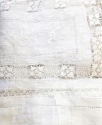 Chinese linen tablecloth with cut work and embroidered detail, the central panel embroidered with