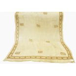 Embroidered sari silk gauze in pale gold colour with gold and silver thread embroidered borders