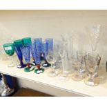 Four 19th century shot glasses, three green glass wines, a Bristol blue glass sherry, six blue twist