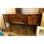 George III mahogany serpentine-fronted sideboard with central curved drawer and flush fitting arched