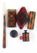 Various tartan mauchlinware items including a nib holder marked 'Prince Charlie Loch Lomond' with