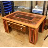 20th century custom made coffee table in Macassar ebony veneer with walnut lippings, leather covered