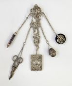 Victorian silver chatelaine of rococo style design, with pierced scrolls and cherubs, suspended with