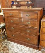 Victorian walnut chest of two short and three long graduated drawers, with later brass ornate