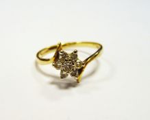 9ct gold and diamond cluster ring, in six pointed star setting