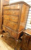 Queen Anne walnut chest on stand having ogee cornice, the upper section with two short and three