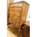 Queen Anne walnut chest on stand having ogee cornice, the upper section with two short and three