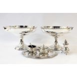 Pair of EPNS tazzas marked 'Gladwin', a silver plated cruet set including mustard pot with liner,