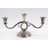 Danish white metal three-branch candelabrum having pair scroll branches and on circular foot, 16cm