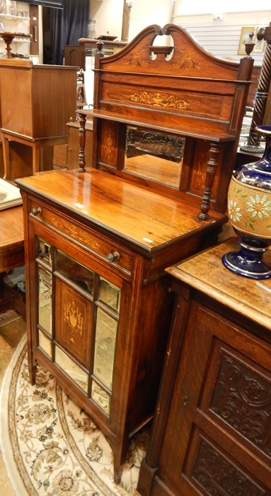 Edwardian inlaid rosewood music cabinet, the raised back with swan neck pediment, small shelf, on