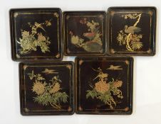 Set of five Japanese graduated lacquer small trays, square, each decorated with exotic bird on