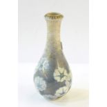 Japanese porcelain vase, baluster-shaped with allover flowerhead decoration on a gilt and blue