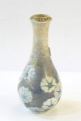 Japanese porcelain vase, baluster-shaped with allover flowerhead decoration on a gilt and blue