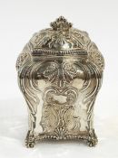 Victorian silver tea caddy by Thomas Bradbury, London 1894, of bombe form, repousse with shells,