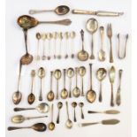 Assortment of silver and EPNS including coffee spoons, butter knives, sugar sifters, sugar tongs,