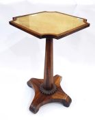 Antique rosewood occasional table, the square glass top with incuse corners, on panelled tapered