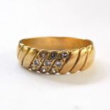 18ct gold wedding band set with nine white stone chips, size L, 3.6g