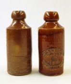 Two Schweppes stoneware ginger beer bottles with impressed marks (2)