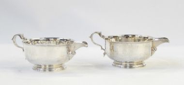 Early 20th century pair silver cream jugs retailed by 'Tessiers Limited, London', London 1937,