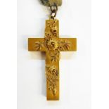 Victorian gold-coloured metal cross locket pendant applied with passion flower decoration and having