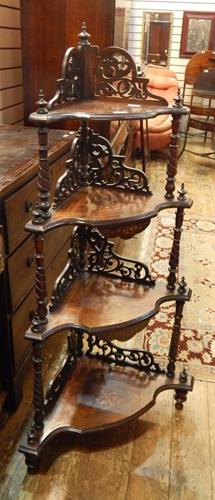 Victorian inlaid figured walnut four-tier whatnot with pierced scroll fretwork to each tier,