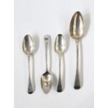 Three Georgian Old English feather-edged dessert spoons and a similar tablespoon, various dates, 5.