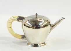 18th century Russian silver bullet-pattern teapot with ovoid body, flush hinged lid, straight