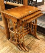 Reproduction mahogany nest of trio occasional tables, rectangular, on slender double-turned standard