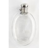 19th century silver topped flask with hallmarked silver bayonet fitting lid and clear glass body,