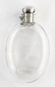 19th century silver topped flask with hallmarked silver bayonet fitting lid and clear glass body,