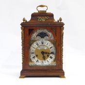 Reproduction bracket-style metal-mounted figured walnut bracket clock, having scroll handle to the