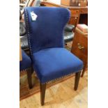 Pair of modern navy velvet wing side chairs with silver-coloured stud borders and silver-coloured