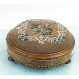 Pair of Berlin Work circular covered footstools on three pad feet, walnut, with geometric inlay