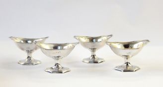 Early set of four pedestal George III silver salts of hexagonal boat-shaped design, ropetwist