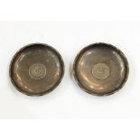 Pair Chinese silver coin inset trinket dishes, marked 'Sterling Silver, made in Hong Kong', 7.5cm