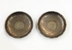 Pair Chinese silver coin inset trinket dishes, marked 'Sterling Silver, made in Hong Kong', 7.5cm