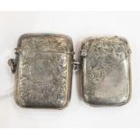 Two late 19th/early 20th century Birmingham silver vestas, both with engraved foliate decoration,