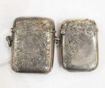 Two late 19th/early 20th century Birmingham silver vestas, both with engraved foliate decoration,