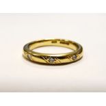 9ct yellow gold and diamond ring, gypsy set with three small stones in diagonal bands , approx 3g
