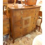 20th century polished wood bowfront chest of five graduated drawers with brass drop scroll handles