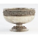 Walker & Hall silver pedestal bowl, circular with floral repousse decoration, Sheffield, 32.85oz