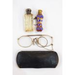 Miniature cut glass scent bottle with silver-coloured screw top, blue cased ruby cut glass miniature