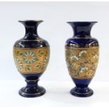 Pair of Doulton vases, blue with various stamp marks to base, incised decoration in turquoise and