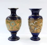 Pair of Doulton vases, blue with various stamp marks to base, incised decoration in turquoise and